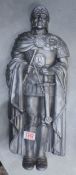 Cast metal Roman Centurion flat-back wall plaque, height 53cm.