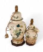 Two Masons 'Chartreuse' design footed lamp bases on wooden plinths (unchecked) tallest:- 45cm