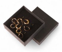 Four pairs of new 9ct gold earrings,2.5g.