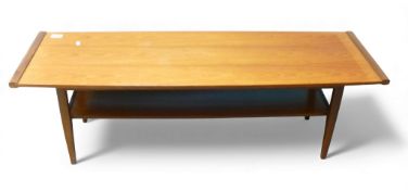 Mid Century teak rectangular coffee table with magazine shelf. H36cm x W114cm x D38cm. COURIER OR