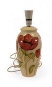 Moorcroft table lamp in the Pink Magnolia pattern on cream ground (H: 35cm)