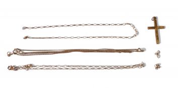 yellow metal cross and broken chain, electronically tested to be 9ct gold, 2,1g.