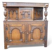 Oak small sized carved court cupboard, H124cm x W121cm x D49cm. COURIER OR COLLECTION ONLY