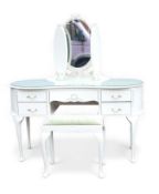 A cream French style kidney shaped dressing table with triple oval mirror and gilt accents, H140cm x
