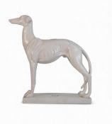 Composite figure of a Grey hound standing on a plinth. H:-30cm