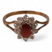9ct gold ring set with red & white stones, 1.6g.
