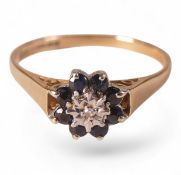 9ct gold ring set with dark blue and white stones, size T/U, 2.8g.