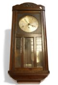 Edwardian oak wall clock, H76cm x W31.5cm.