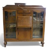 Early 20th century, Art Deco mahogany side by side bureau bookcase, H145cm x W137cm x D30cm. COURIER