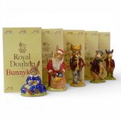 Royal Doulton Bunnykins Characters presents:- Santa DB17, Spring Time DB7, Autumn Days DB5, The
