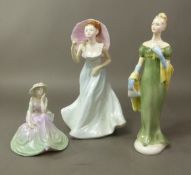 Two Coalport lady figurines, an unnamed lady with an umbrella, small figure Fascination, together