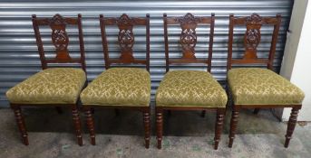 Set of four Victorian mahogany dining chairs, with carved backs and turned front supports (4).