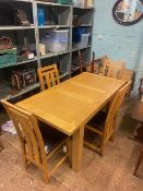 Modern solid oak dining table and 4 matching chairs, L 153cm x H 78cm x W 80cm.
