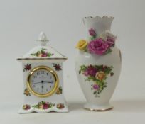 Royal Albert 'Old Country Roses' footed vase with applied roses and butterfly together with a mantel