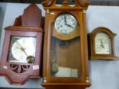 Group of three wooden cased wall and mantle clocks (3).