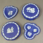 Wedgwood Dark Blue Dip Ware depicting neoclassical designs in white relief to include:- two lidded