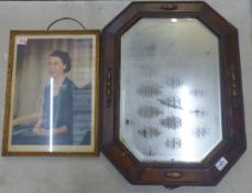 Framed photographic print of Her Majesty The Queen, together with an oak framed mirror, size of