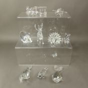 A mixed collection of Swarovski Crystal Animal figures and ornaments to include a Locomotive,