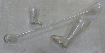 A glass 'Yard of Ale', together with a 2 litre drinking vessel in boot form and a similar 0.4