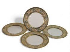 De Lamerie Fine Bone China, heavily gilt on blue plates. Made in England (4)