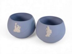 Wedgwood pale blue Jasperware pair of Vases with a ripple effect pattern with a piper relief
