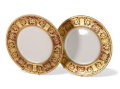 De Lamerie Fine Bone China, heavily gilt plates with red banding. Made in England (2)