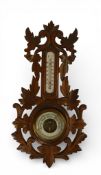 Antique Black Forest, Wood-Carved wall barometer and thermometer, scrollwork and leaf motifs. H:-