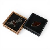 2 x very large sterling silver and faux amber brooches.