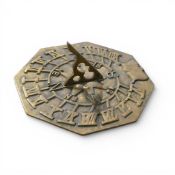 Brass Octagonal Sun Dial with Roman numerals. 27cm dia.