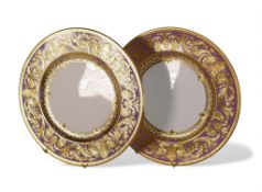 De Lamerie Fine Bone China, heavily gilt plates on pink. Made in England (2)
