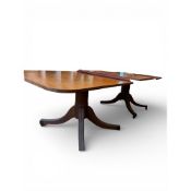 Mahogany twin pillar pedestal dining table with brass castors & leaf, measurements including