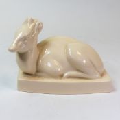 A Wedgwood Queen's Ware model of a Duiker resting on a composite plinth, Art Deco design by John