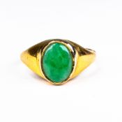 Yellow metal ring set with small oval jade stone, electronically tested to be 22ct Gold, size L, 8.