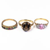 Three 9ct Gold rings, each set with various semi precious gemstones, size N, 5.7g. (3)