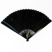 A Black Victorian Mourning fan, black paper leaf with a very fine ebonised wooded frame. H:-40cm