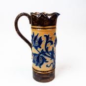 Mark V Marshall, Royal Doulton Lambeth stoneware ewer, decorated with incised foliate pattern in