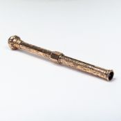 Victorian 9ct Rose gold propelling pen, dark green seal to end, overall length 12.5cm, 15.2g.