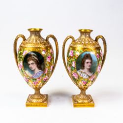 Pair of 19th century Copelands China two handled vases, heavily gilded all around with trails of