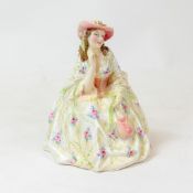 Royal Doulton early figure Herminia HN1644, in floral colourway, dated 1934, h.18cm.