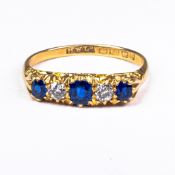 18ct Gold ring, set with blue sapphires and diamonds, size S, 3.6g.