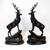 A pair of hollow cast bronze stag figurines, after Jules Moigniez (French 1835 - 1894), each