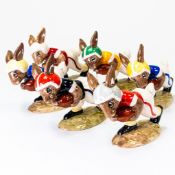 Royal Doulton Bunnykins characters presenting Six colourways of 'Touchdown' to include:- Blue with