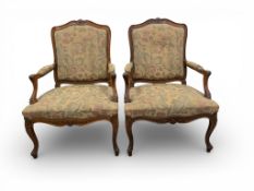 French Louis XV style needlepoint armchair with floral design & carved decoration. COURIER OR