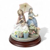 Lladro 'Flowers For Sale' Model No:- 5537, designed by Jose Punche (1989). The figure depicts Two