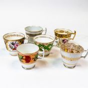A collection of 19th century tea cups in various patterns with gilt highlights. (6)