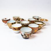 A collection of 19th century porcelain tea cups in various patterns from different manufacturers