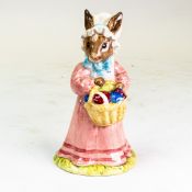 Royal Doulton Bunnykins character presenting Mrs Bunnykins Easter Parade DB52, in a pink