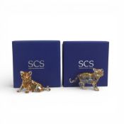 Two Swarovski Amber Crystal Tiger Cub (1051686) together with (1016678) retired 2010, designed by