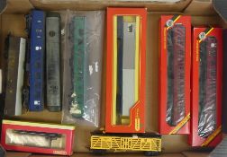 A collection of loose and boxed Hornby and Tri-ang OO/HO gauge passenger carriages and freight