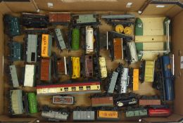 A collection of loose OO/HO gauge freight and passenger carriages to include tankers, vans and
